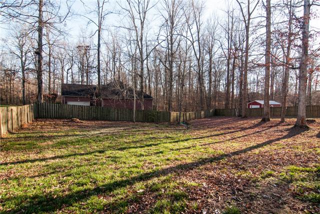 1216 Camp Ravine Road Burns, TN 37029 - Photo 20 of 20 a swimming pool with outdoor seating and yard