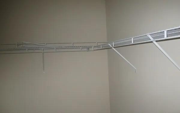 a view of a room with racks on the wall