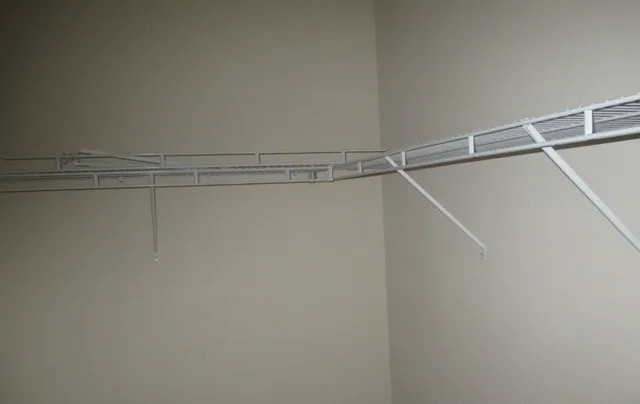 a view of a room with racks on the wall