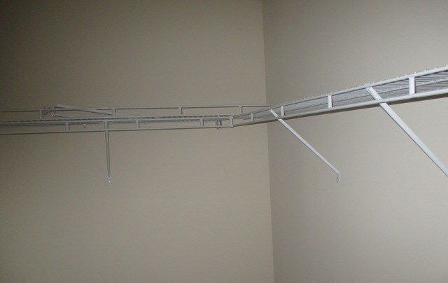 27 Sword Street Fort Mitchell, AL 36856 - Photo 12 of 17 a view of a room with racks on the wall