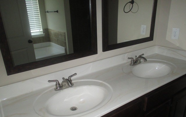 27 Sword Street Fort Mitchell, AL 36856 - Photo 13 of 17 a bathroom with a sink and a mirror