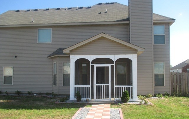 27 Sword Street Fort Mitchell, AL 36856 - Photo 17 of 17 a front view of a house with garden