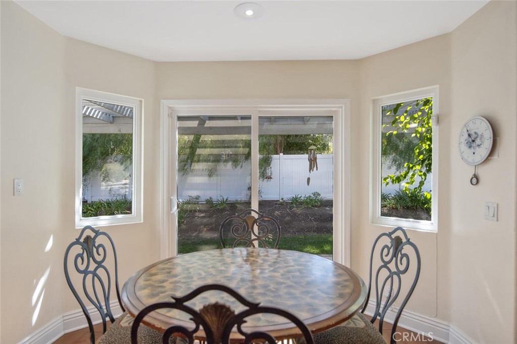 12738 Rosedale Court Camarillo, CA 93012 - Photo 16 of 66 a view of a dining room with furniture window and outside view