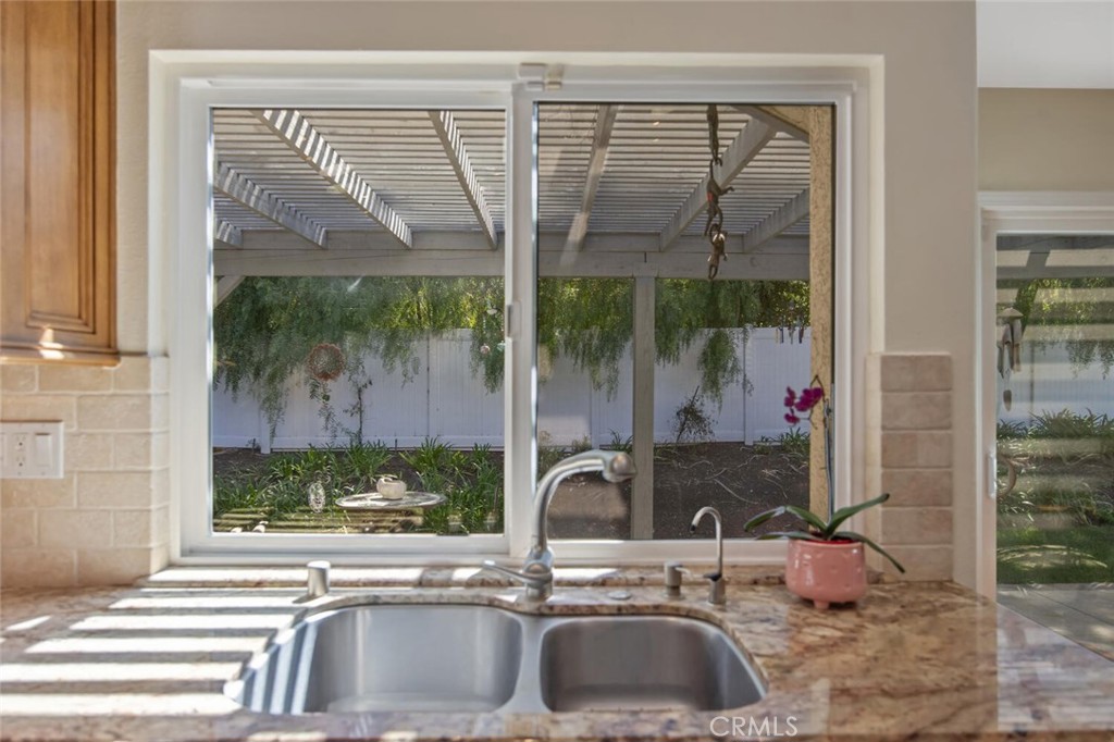 12738 Rosedale Court Camarillo, CA 93012 - Photo 21 of 66 a bathroom with a sink and a large window