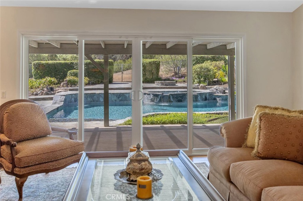12738 Rosedale Court Camarillo, CA 93012 - Photo 26 of 66 a living room with furniture and a large window