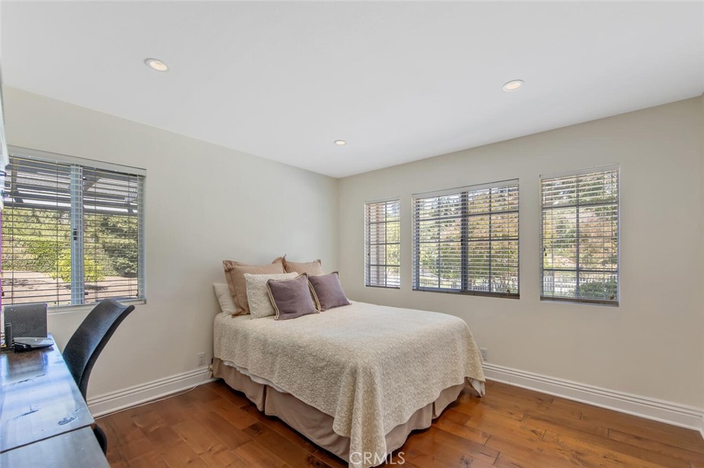 12738 Rosedale Court Camarillo, CA 93012 - Photo 28 of 66 a bedroom with a large bed and a large window
