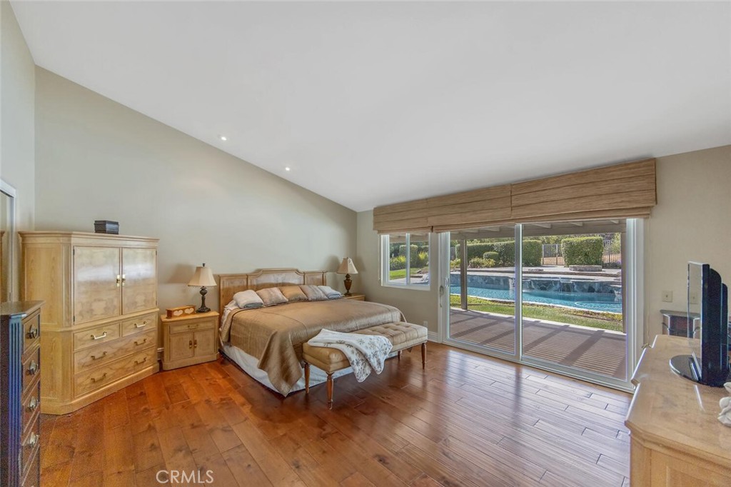 12738 Rosedale Court Camarillo, CA 93012 - Photo 32 of 66 a bedroom with a bed and a view of living room