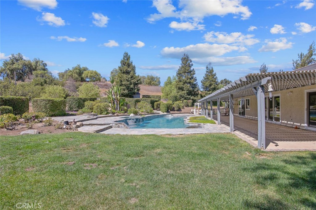 12738 Rosedale Court Camarillo, CA 93012 - Photo 55 of 66 a view of a house with swimming pool and sitting area