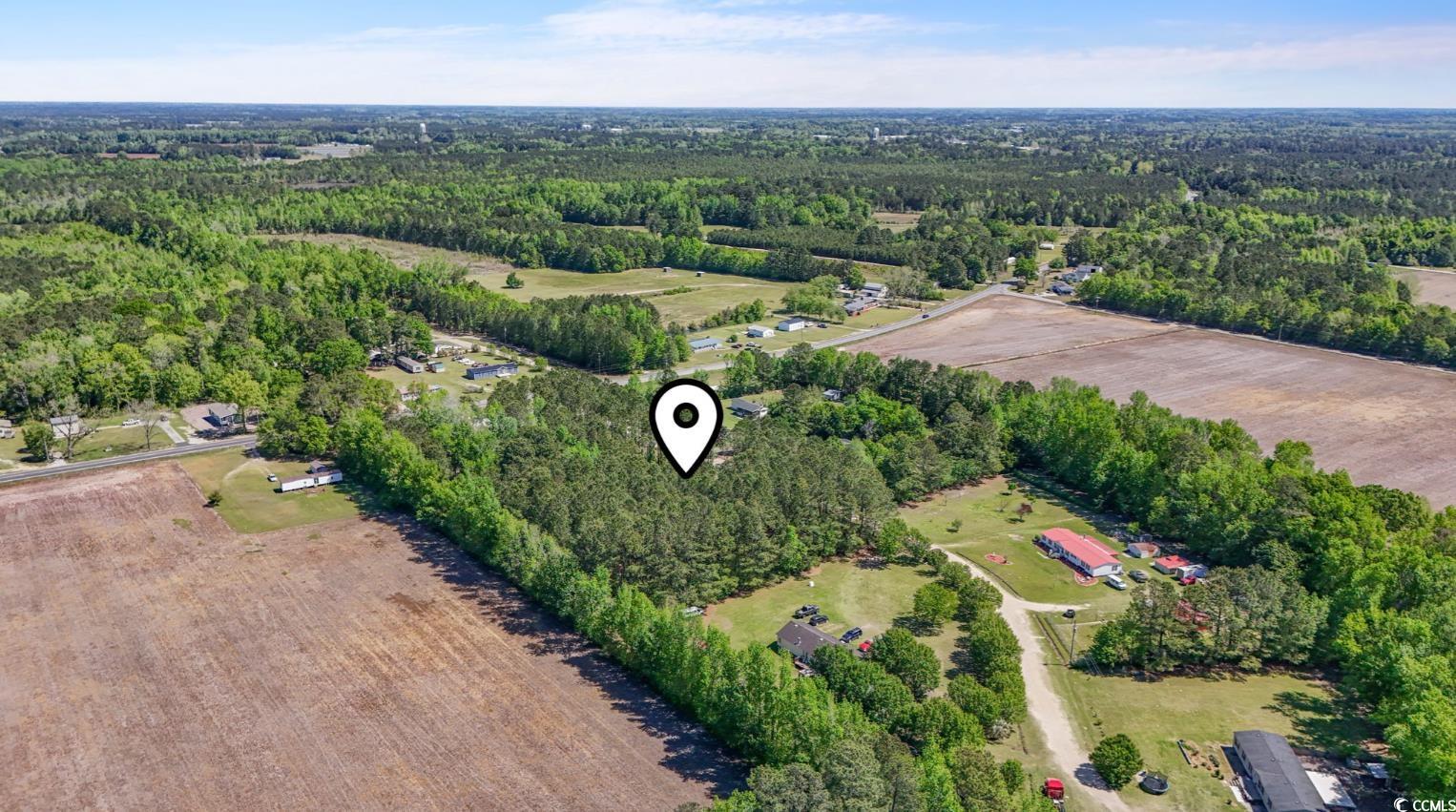 Kickapoo Dr Green Green Sea, SC 29545 - Photo 7 of 10 Aerial view featuring a wooded view