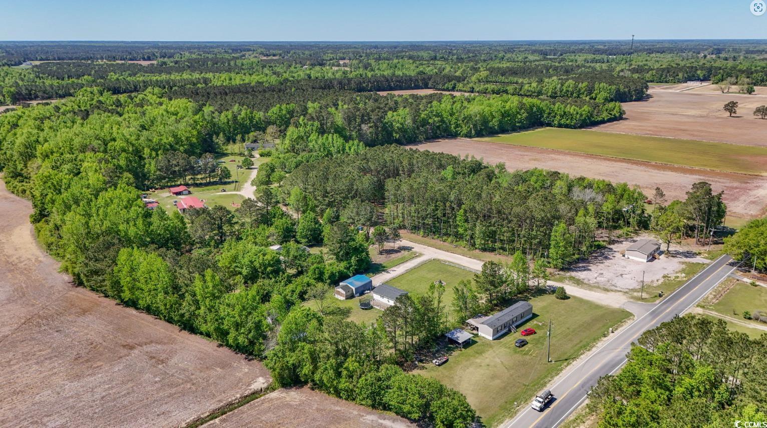 Kickapoo Dr Green Green Sea, SC 29545 - Photo 9 of 10 Aerial view featuring a wooded view