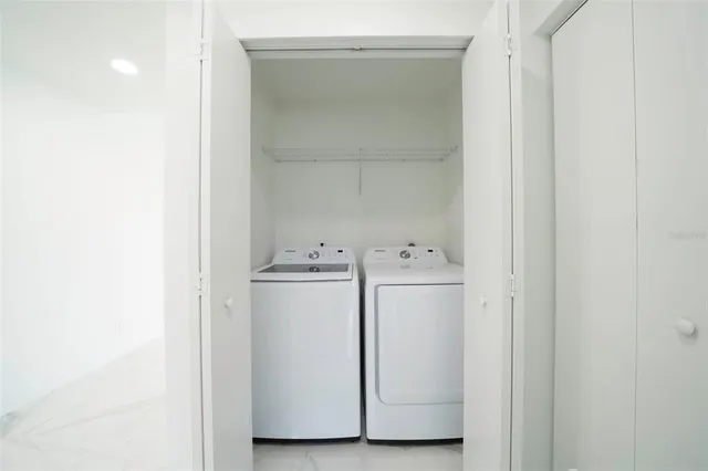 a bathroom with a sink vanity and a mirror