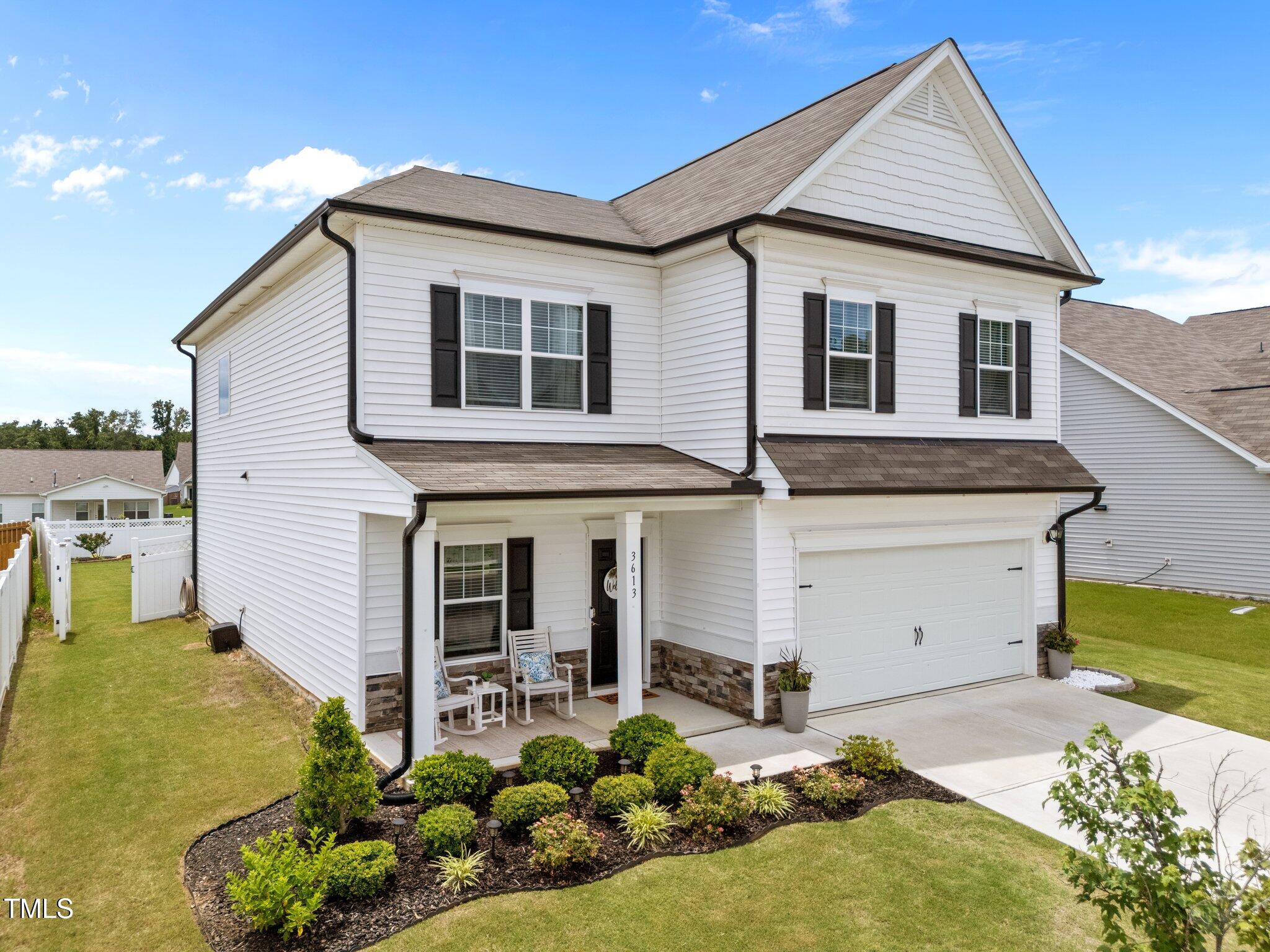 3613 Cross Timber Lane Raleigh, NC 27603 - Photo 4 of 33 Beautiful landscaping and easy to maintain ! Corner Lot and one of the largest !