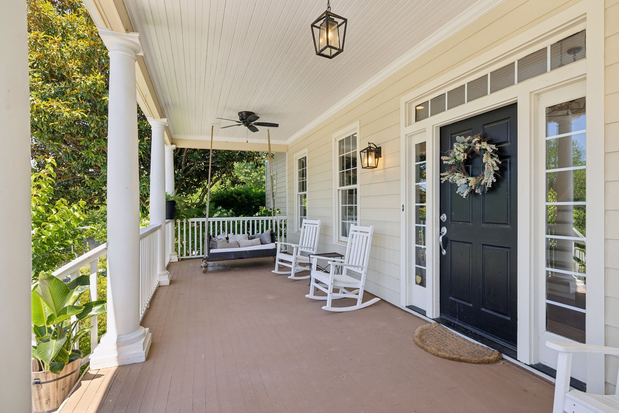6795 Leipers Creek Road Columbia, TN 38401 - Photo 13 of 98 a view of a porch with furniture and garden view