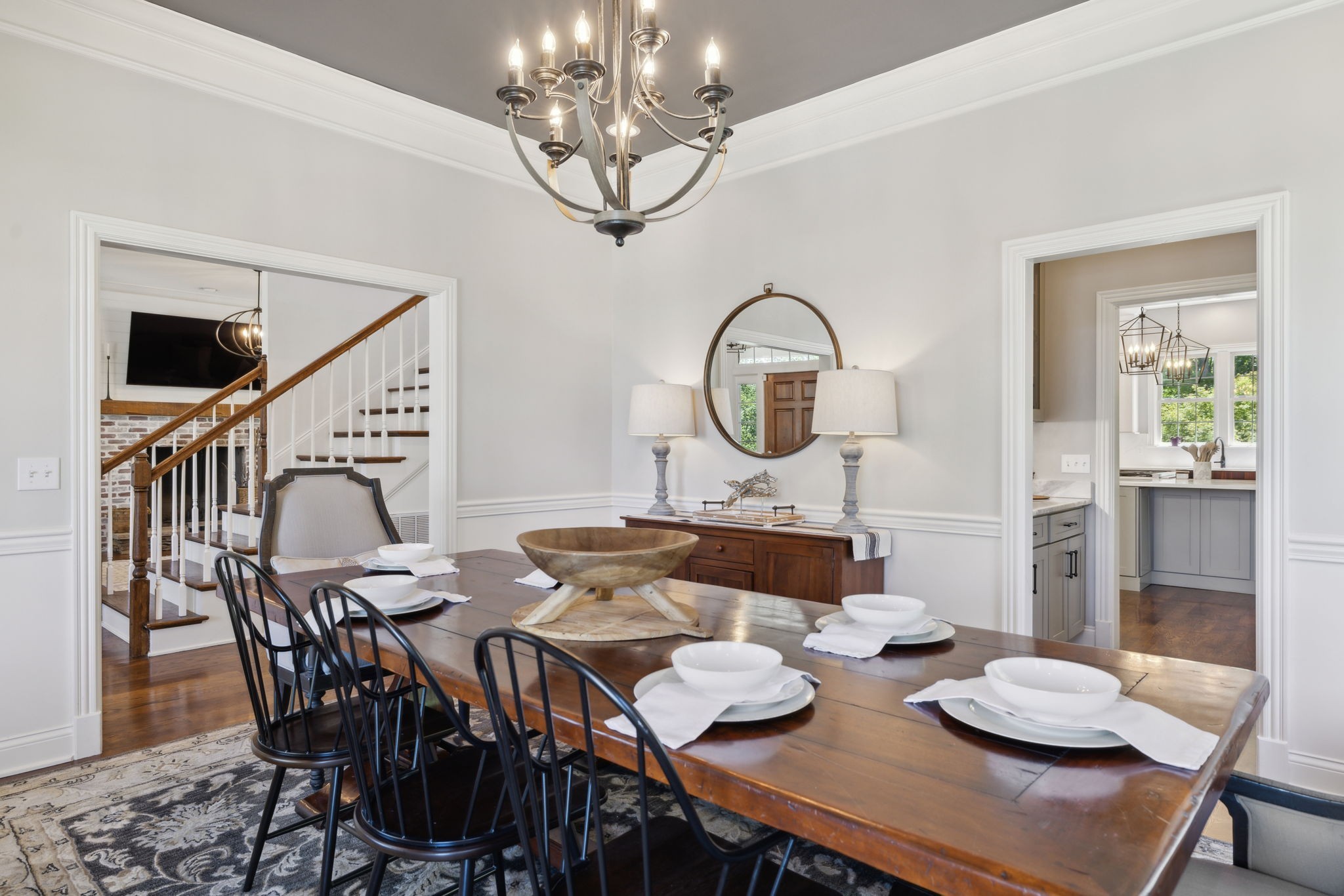 6795 Leipers Creek Road Columbia, TN 38401 - Photo 25 of 98 a view of a dining room with furniture a chandelier and wooden floor