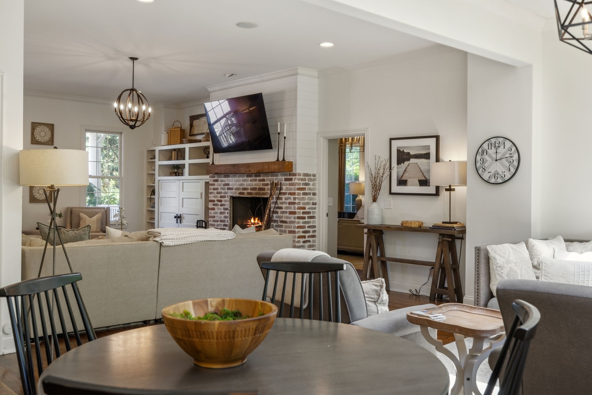 6795 Leipers Creek Road Columbia, TN 38401 - Photo 45 of 98 a living room with furniture a flat screen tv and a fireplace