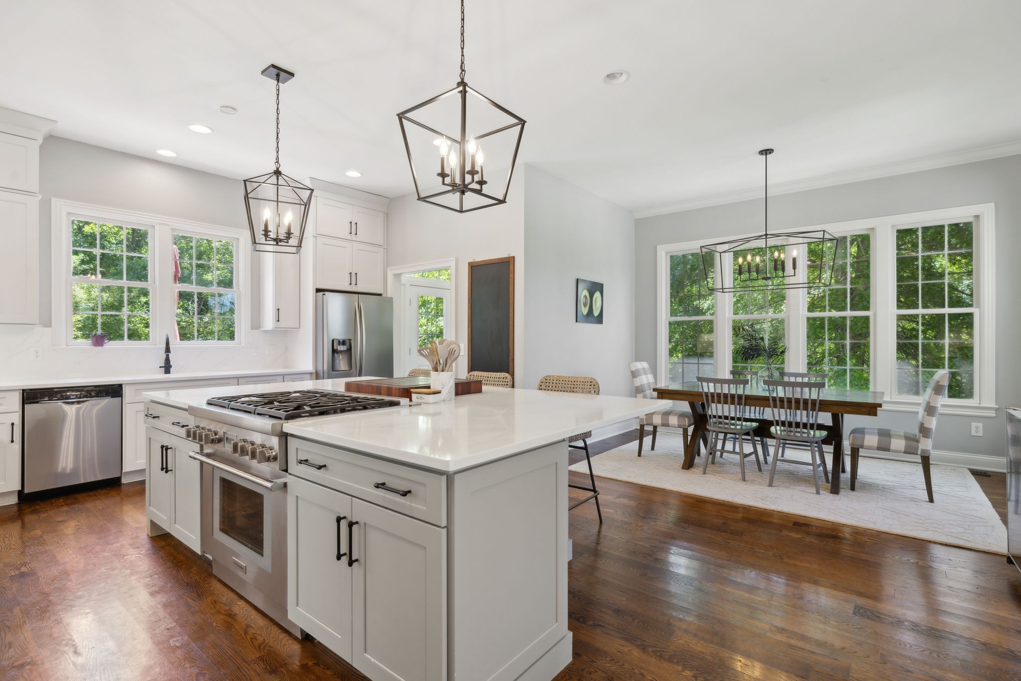 6795 Leipers Creek Road Columbia, TN 38401 - Photo 52 of 98 a kitchen that has a stove a table and chairs in it