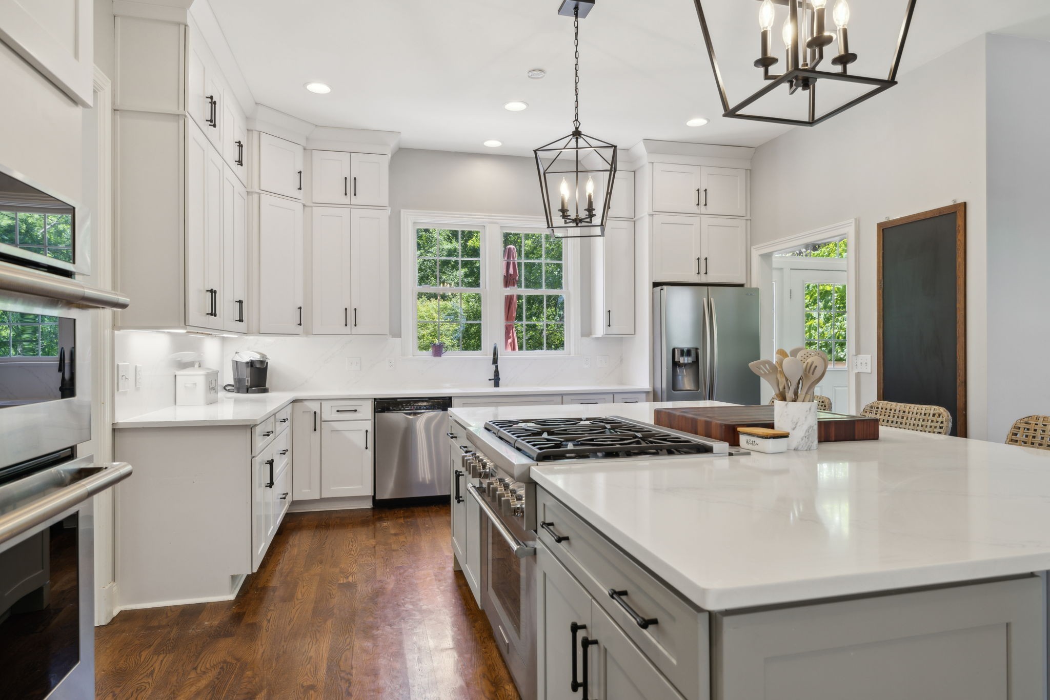 6795 Leipers Creek Road Columbia, TN 38401 - Photo 53 of 98 a kitchen with stainless steel appliances granite countertop a sink a stove and a refrigerator