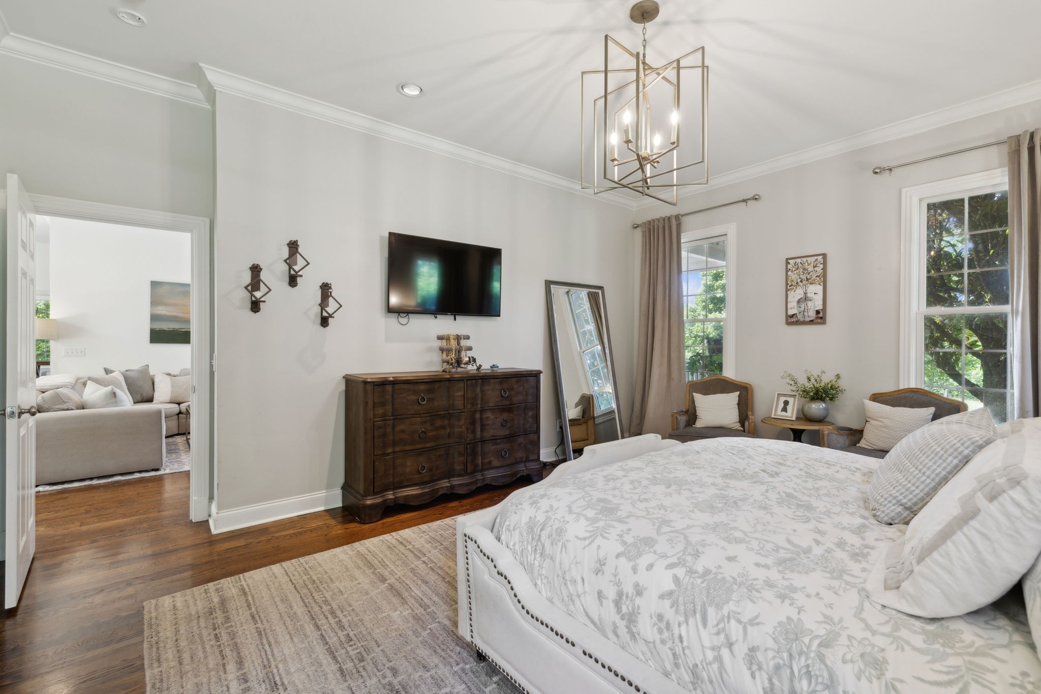 6795 Leipers Creek Road Columbia, TN 38401 - Photo 64 of 98 a bedroom with a bed and a flat screen tv