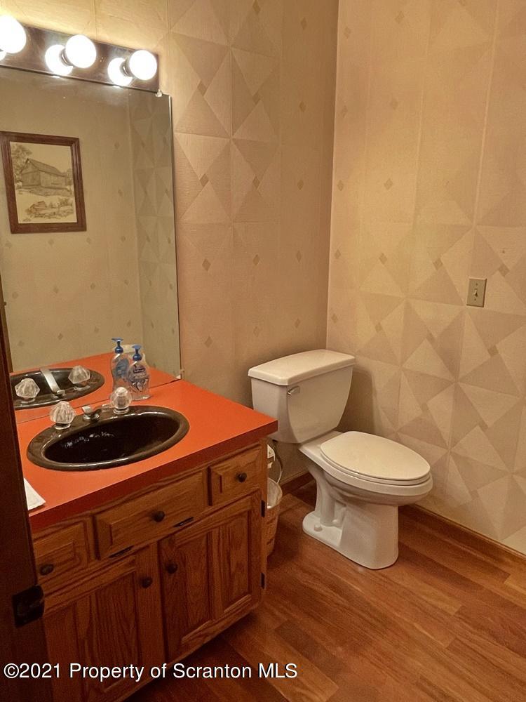 2480 Madisonville Road Moscow, PA 18444 - Photo 13 of 22 a bathroom with a toilet and a sink