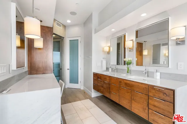 a bathroom with a shower and a tub