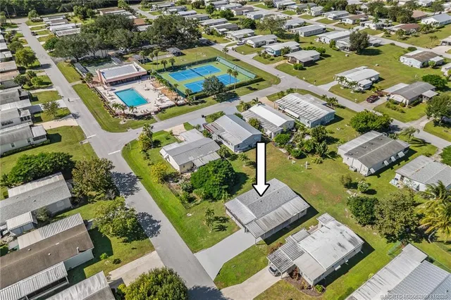 an aerial view of a city with lots of residential buildings