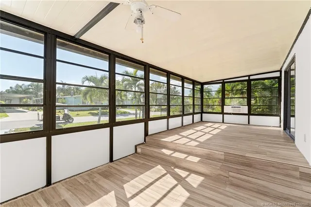 a view of hallway with a large window