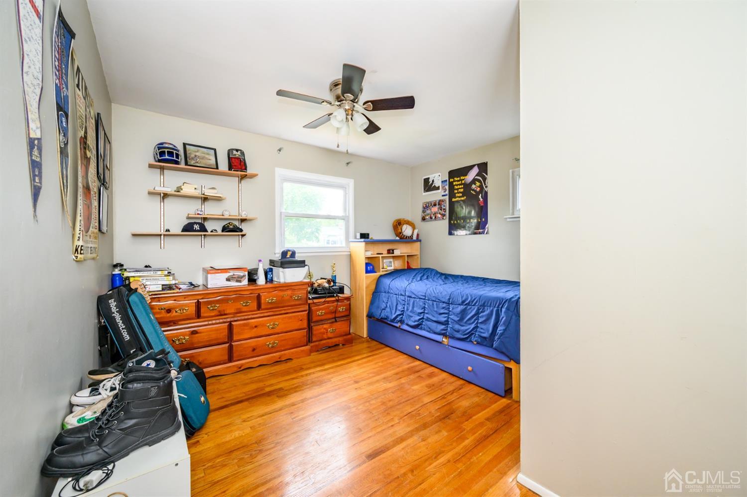 11 Atlantic Road Somerset, NJ 08873 - Photo 15 of 35 a bedroom with furniture and window