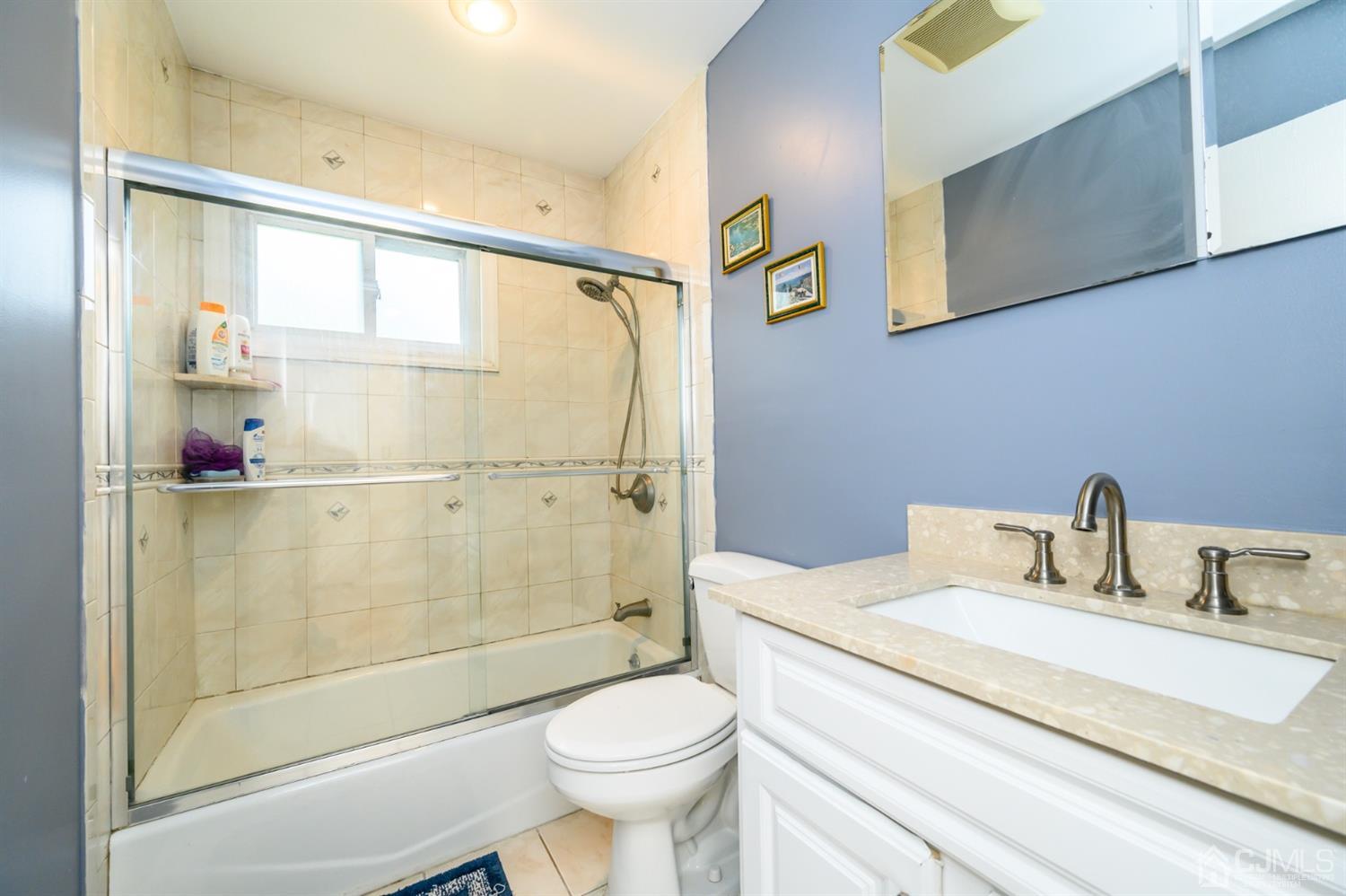 11 Atlantic Road Somerset, NJ 08873 - Photo 21 of 35 a bathroom with a sink toilet and shower