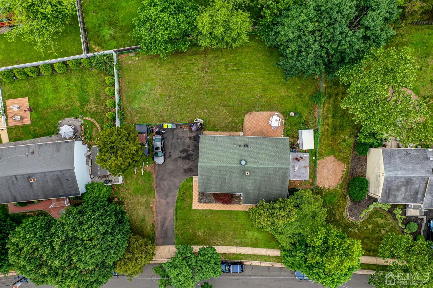 11 Atlantic Road Somerset, NJ 08873 - Photo 33 of 35 an aerial view of a house with a yard and lake view