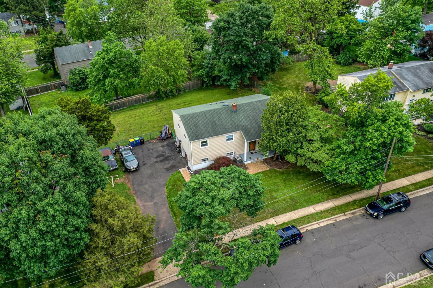11 Atlantic Road Somerset, NJ 08873 - Photo 34 of 35 an aerial view of a house with a yard