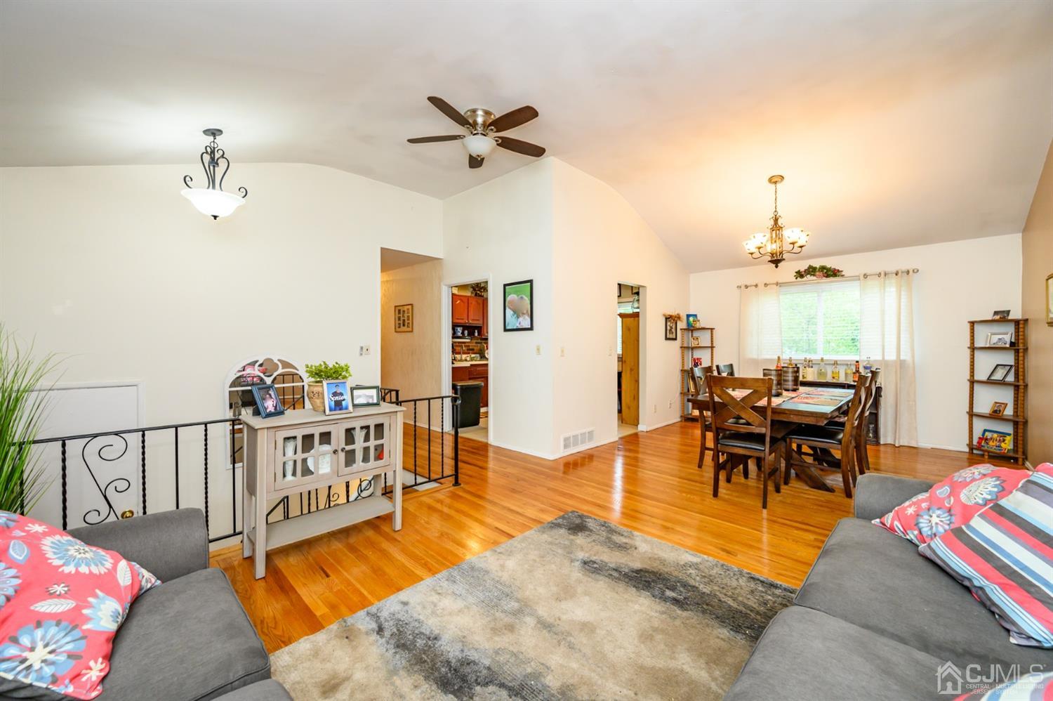 11 Atlantic Road Somerset, NJ 08873 - Photo 5 of 35 a living room with furniture and wooden floor