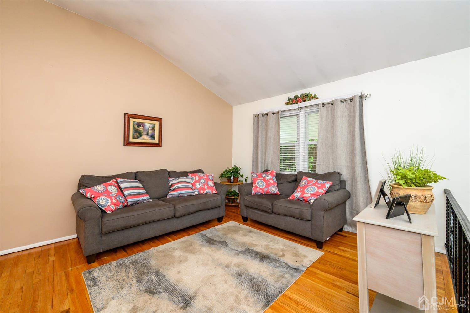 11 Atlantic Road Somerset, NJ 08873 - Photo 6 of 35 a living room with furniture and a couch