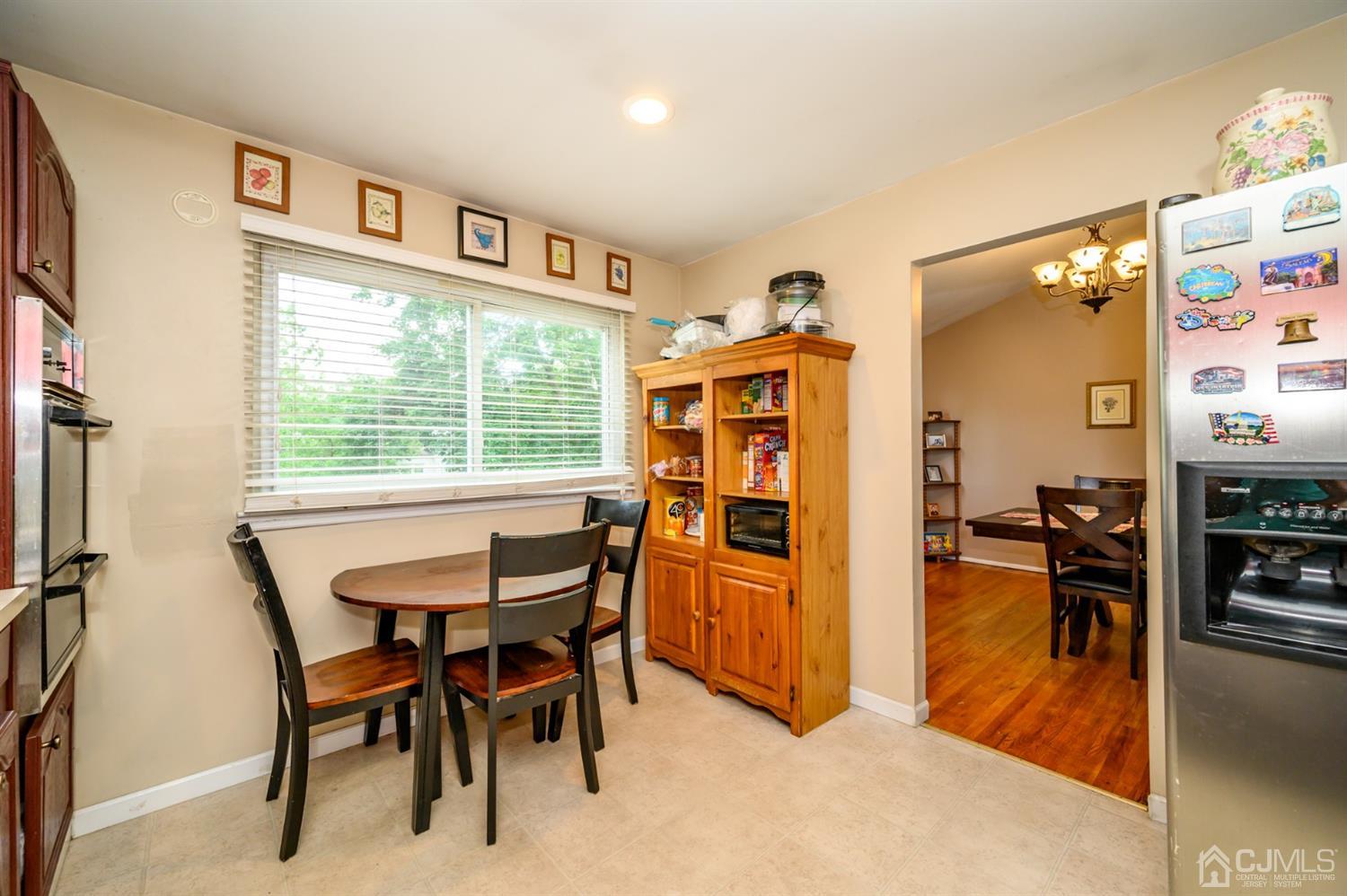 11 Atlantic Road Somerset, NJ 08873 - Photo 9 of 35 a dining room with furniture and a window