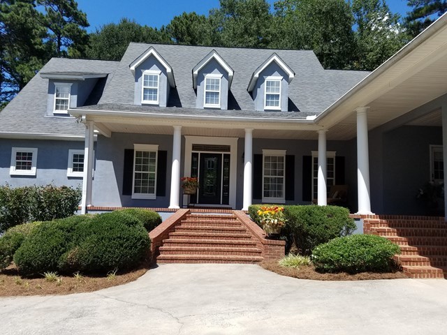 722 Bass Road Macon, GA 31210 - Photo 1 of 40 a front view of a house with a yard