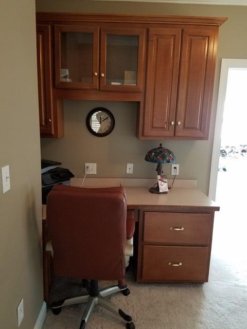 722 Bass Road Macon, GA 31210 - Photo 20 of 40 a room with a cabinets and a window