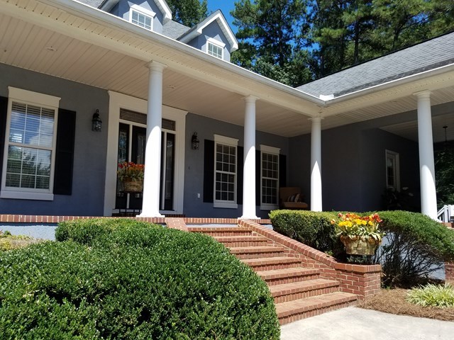 722 Bass Road Macon, GA 31210 - Photo 3 of 40 a front view of a house with garden