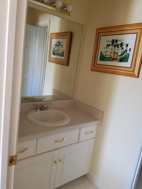 722 Bass Road Macon, GA 31210 - Photo 28 of 40 a bathroom with a sink and a mirror