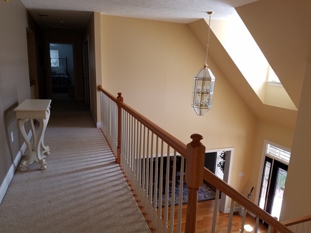 722 Bass Road Macon, GA 31210 - Photo 33 of 40 a view of a hallway with wooden floor and stairs