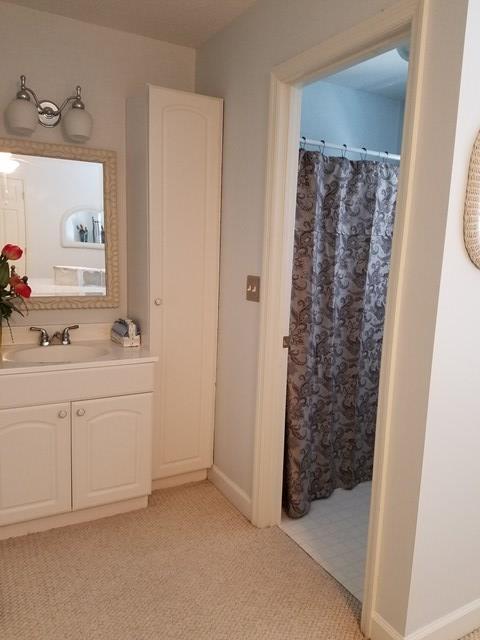722 Bass Road Macon, GA 31210 - Photo 34 of 40 a bathroom with a sink and a mirror