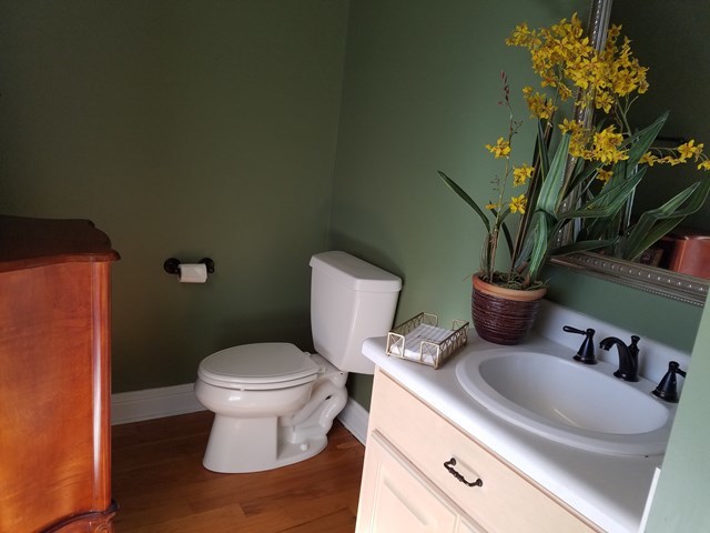 722 Bass Road Macon, GA 31210 - Photo 37 of 40 a bathroom with a toilet and a sink