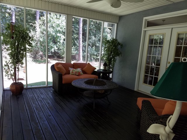 722 Bass Road Macon, GA 31210 - Photo 38 of 40 a living room with furniture and a potted plant