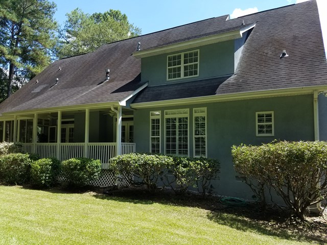 722 Bass Road Macon, GA 31210 - Photo 5 of 40 a front view of a house with a yard and potted plants