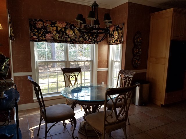 722 Bass Road Macon, GA 31210 - Photo 10 of 40 a view of a dining room with furniture and window