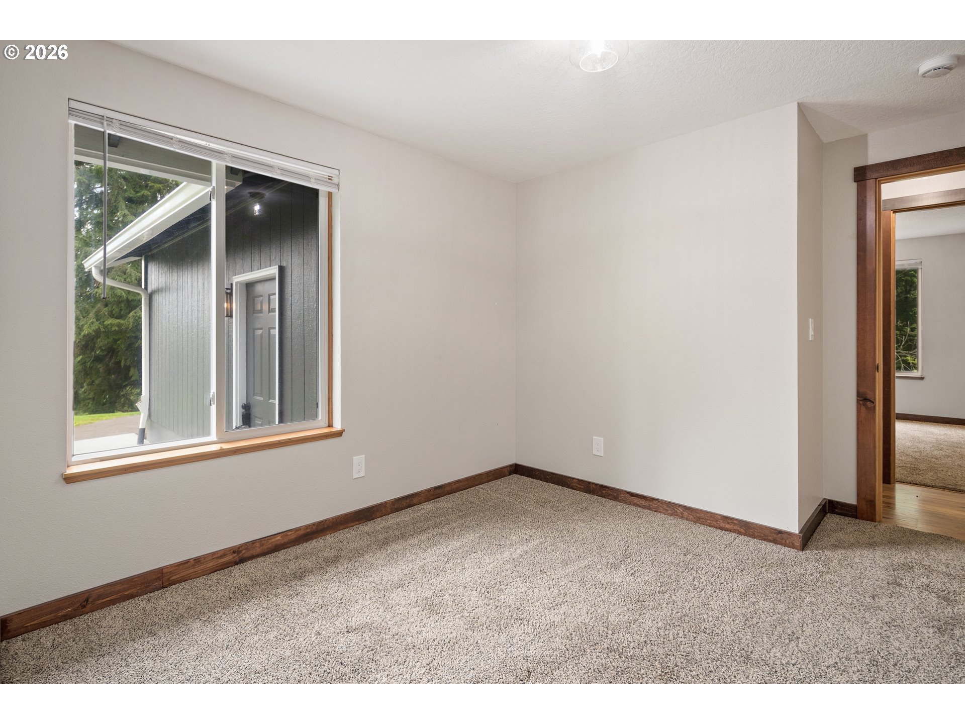 650 Marvin Road Tillamook, OR 97141 - Photo 33 of 48 a view of an empty room with a window