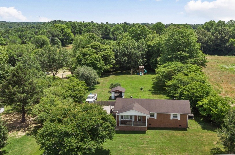 1823 Evins Mill Road Smithville, TN 37166 - Photo 1 of 19 a aerial view of a house with a big yard