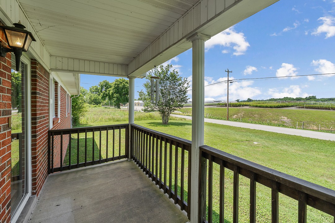1823 Evins Mill Road Smithville, TN 37166 - Photo 16 of 19 a view of a balcony with ocean view