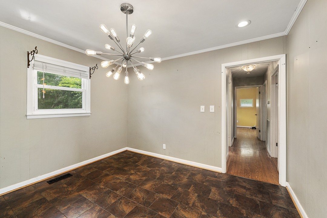 1823 Evins Mill Road Smithville, TN 37166 - Photo 6 of 19 wooden floor in an empty room and a window