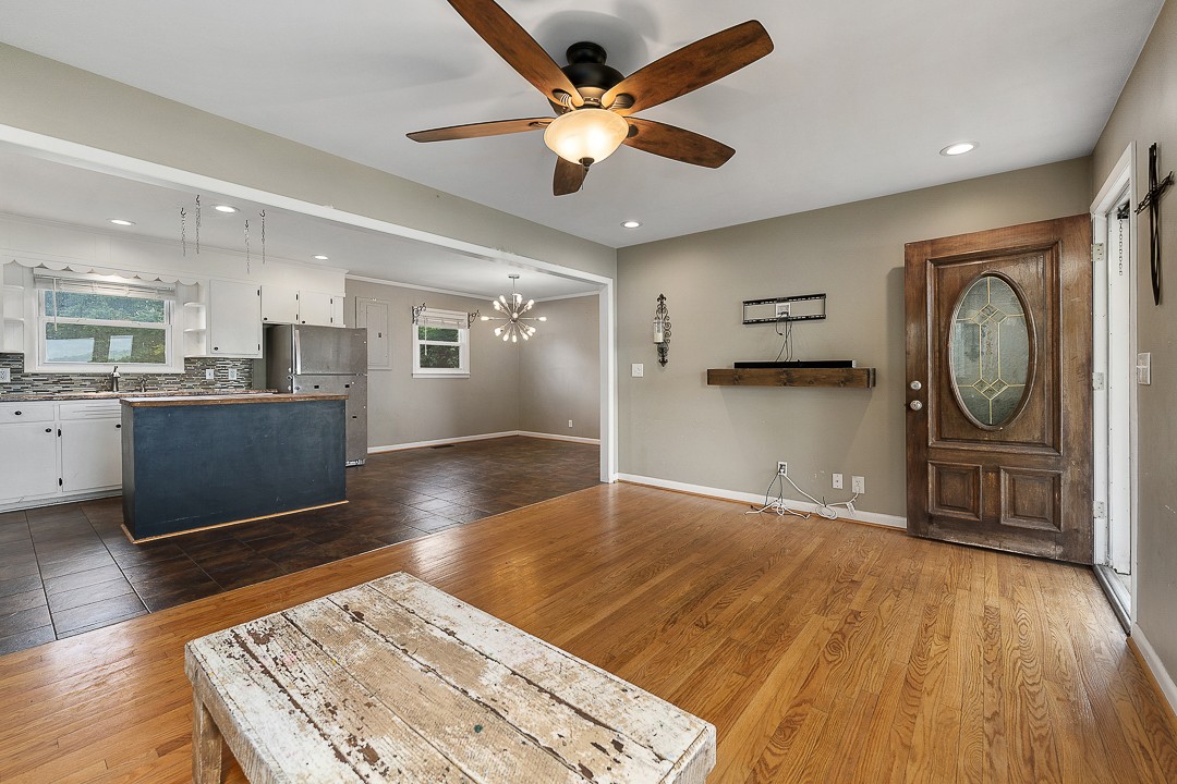 1823 Evins Mill Road Smithville, TN 37166 - Photo 9 of 19 a view of a kitchen with a stove cabinets and wooden floor