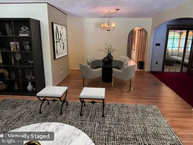 a kitchen with stainless steel appliances a sink and a refrigerator