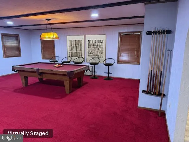a view of a room with wooden floor and a window